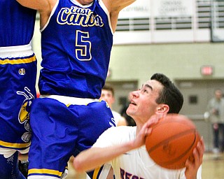 William D. Lewis the Vindicator  WR's Dom Velasquez(2) is hemmed in by East Canton's Joey Knopp(5) at Struthers 3-9-18.