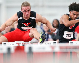 YOUNGSTOWN, OHIO - FEBRUARY 24, 2018: 2018 Horizon League Indoor Track & Field Championships-  YSU Penguins' Char Zallow (387) runs 7.65 secs to qualify with the best time for the mens' 60m hurdle final at Watson and Tressel Training Site, YSU, Youngstown, OH.  MICHAEL G. TAYLOR | THE VINDICATOR