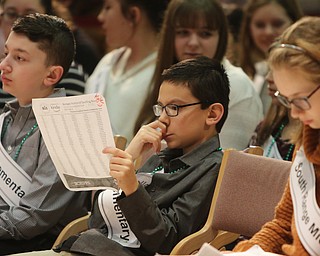             ROBERT  K. YOSAY | THE VINDICATOR..The 85th Spellling Bee at YSU and Kilcawley Center - 44 spellers came  down to  Mackenzie Sambroak 5th grader from Roosevelt Elementary in McDonald...Kyle England Lowellvill Elementar ponders some wors before the start of the BEE