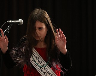             ROBERT  K. YOSAY | THE VINDICATOR..The 85th Spellling Bee at YSU and Kilcawley Center - 44 spellers came  down to  Mackenzie Sambroak 5th grader from Roosevelt Elementary in McDonald...Karen Donald 5th grade Campbell Elementary and Middle  gives a hands up as she spells her word right