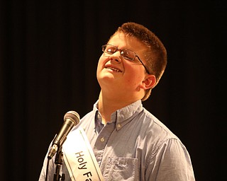             ROBERT  K. YOSAY | THE VINDICATOR..The 85th Spellling Bee at YSU and Kilcawley Center - 44 spellers came  down to  Mackenzie Sambroak 5th grader from Roosevelt Elementary in McDonald...Ouch as Holy Family  David Vuksanovich 8th grade reacts to missing his word