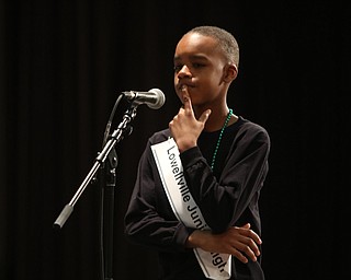             ROBERT  K. YOSAY | THE VINDICATOR..The 85th Spellling Bee at YSU and Kilcawley Center - 44 spellers came  down to  Mackenzie Sambroak 5th grader from Roosevelt Elementary in McDonald...Hmmm Lowellville Jr High  Braylen Dabney.. thinks about his word