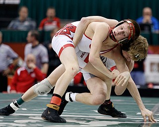 Beaver's Cole McComas, top, works against Graham's Tanner Jordan in a 113 pound championship match during the Division II Ohio state wrestling tournament at the Ohio State University Saturday, March 10, 2018. Jordan won 5-3. (Photo by Paul Vernon)