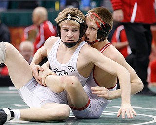 Beaver's Cole McComas, right, works against Graham's Tanner Jordan in a 113 pound championship match during the Division II Ohio state wrestling tournament at the Ohio State University Saturday, March 10, 2018. Jordan won 5-3. (Photo by Paul Vernon)