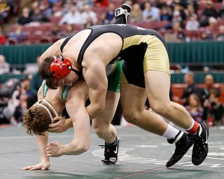 Canfield's David Crawford, top, works against St. Vincent-St. Mary's David Heath in a 182 pound championship match during the Division II Ohio state wrestling tournament at the Ohio State University Saturday, March 10, 2018. Crawford won 5-3. (Photo by Paul Vernon)