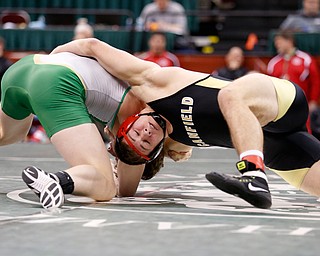 Canfield's David Crawford, right, works against St. Vincent-St. Mary's David Heath in a 182 pound championship match during the Division II Ohio state wrestling tournament at the Ohio State University Saturday, March 10, 2018. Crawford won 5-3. (Photo by Paul Vernon)