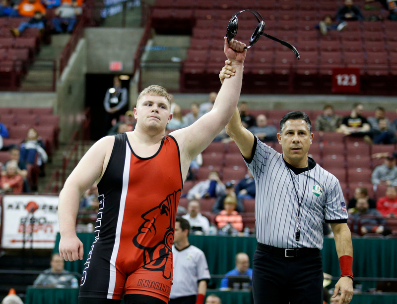 Girard's Jack DelGarbino, left, is declared the winner after his pin on Steubenville's Tyler Ely in a 285 pound championship match during the Division II Ohio state wrestling tournament at the Ohio State University Saturday, March 10, 2018. (Photo by Paul Vernon)