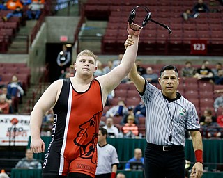 Girard's Jack DelGarbino, left, is declared the winner after his pin on Steubenville's Tyler Ely in a 285 pound championship match during the Division II Ohio state wrestling tournament at the Ohio State University Saturday, March 10, 2018. (Photo by Paul Vernon)