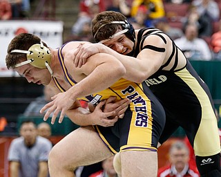 Canfield's Tyler Stein, right, works against Maumee's Brandon Phillips in a 220 pound championship match during the Division II Ohio state wrestling tournament at the Ohio State University Saturday, March 10, 2018. Stein won 7-3. (Photo by Paul Vernon)