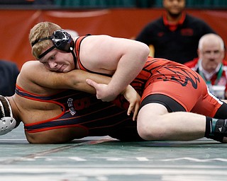 Girard's Jack DelGarbino, top, works against Steubenville's Tyler Ely in a 285 pound championship match during the Division II Ohio state wrestling tournament at the Ohio State University Saturday, March 10, 2018. DelGarbino won by pin. (Photo by Paul Vernon)