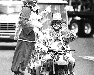 JUST SHOWIN' OFF: Members of the Austintown Fire Department hopped onto "comic cars" and entertained the crowd with their shenanigans...Photo taken March 16, 1986...Photo by Patricia L. Fife.