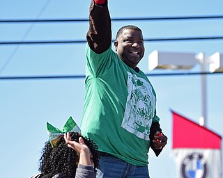 BOARDMAN, OHIO - MARCH 11, 2018: Youngstown Mayor Jamael Tito Brown waives to the parade goers on Market Street during the Mahoning Valley St. Patrick's Day Parade. DAVID DERMER | THE VINDICATOR