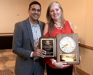 Colleen Murphy-Penk, Youngstown City School District's chief of transportation, won the William Rice Award of Excellence for the Pupil Transportation Supervisor of the Year. With her at the award ceremony in Columbus on Monday is school district CEO Krish Mohip.