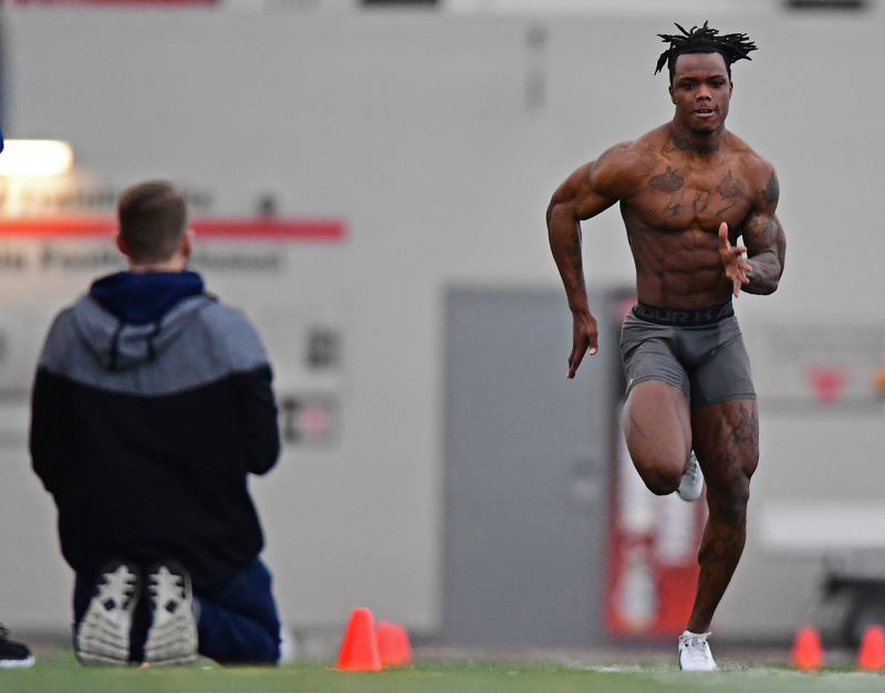 YOUNGSTOWN, OHIO - MARCH 13, 2018: Youngstown State's Damoun Patterson runs the 40 yard dash during the Youngstown State football pro day, Tuesday morning at the Watts Indoor Facility. DAVID DERMER | THE VINDICATOR