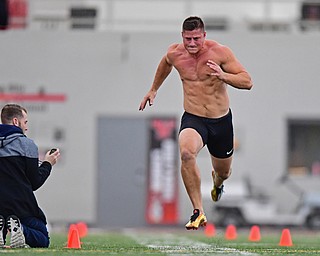 YOUNGSTOWN, OHIO - MARCH 13, 2018: Youngstown State's Kevin Rader runs the 40 yard dash during the Youngstown State football pro day, Tuesday morning at the Watts Indoor Facility. DAVID DERMER | THE VINDICATOR