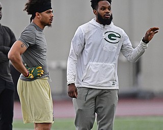 YOUNGSTOWN, OHIO - MARCH 13, 2018: Green Bay Packers scout and former YSU defensive back Brandian Ross, gives instructions to Jalyn Powell and other defensive backs during individual drills during the Youngstown State football pro day, Tuesday morning at the Watts Indoor Facility. DAVID DERMER | THE VINDICATOR