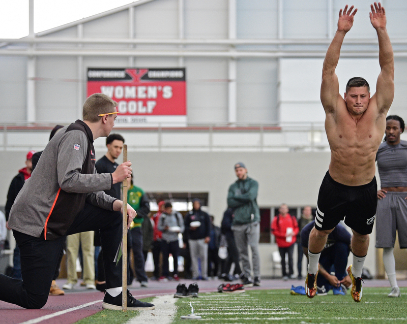 YOUNGSTOWN, OHIO - MARCH 13, 2018: Youngstown State's Kevin Rader takes off while testing his broad jump during the Youngstown State football pro day, Tuesday morning at the Watts Indoor Facility. DAVID DERMER | THE VINDICATOR