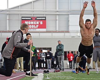 YOUNGSTOWN, OHIO - MARCH 13, 2018: Youngstown State's Kevin Rader takes off while testing his broad jump during the Youngstown State football pro day, Tuesday morning at the Watts Indoor Facility. DAVID DERMER | THE VINDICATOR