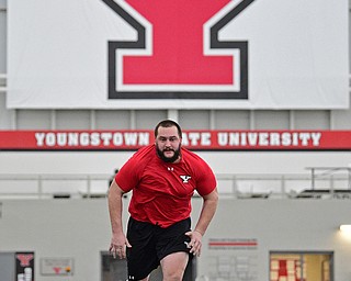 YOUNGSTOWN, OHIO - MARCH 13, 2018: Youngstown State's Justin Spencer competes during a shuttle drill during the Youngstown State football pro day, Tuesday morning at the Watts Indoor Facility. DAVID DERMER | THE VINDICATOR