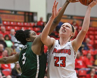  ROBERT K.YOSAY  | THE VINDICATOR..YSU #23 Sarah Cash goes for 2 for a layup as Binghamton#5 Alysssa James defends third quarter action..YSU Women went down to defeat against Binghamton 70-59  but not without a fight- The Penguins led by at least 10 at some point in the first half..-30-