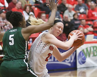  ROBERT K.YOSAY  | THE VINDICATOR..YSU #23  Sarah cash takes one to the head from #5 Binghamton Alyssa James as she tries to pass the ball during third quarter action..YSU Women went down to defeat against Binghamton 70-59  but not without a fight- The Penguins led by at least 10 at some point in the first half..-30-