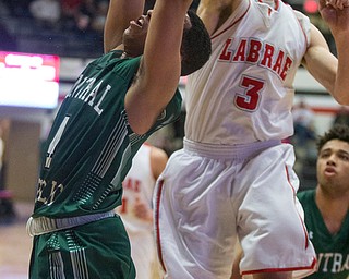 Labrae's Aaron Iler (3) blocks the shot of Central Catholic's Cortez Simmons (4) during the Division III regional semifinal at the Memorial Field House in Canton, OH on Wednesday, March 14, 2018. (CantonRep.com / Bob Rossiter)