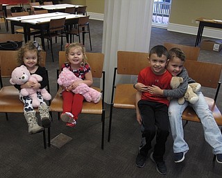 Neighbors | Zack Shively.The Poland library hosted a Teddy Bear Tea event on Feb. 16. The event benefitted the Springfield library. Pictured, from left, Delana Ragan, Camille Miner, John Ragan and Jack Miner attended the event with their teddy bears.