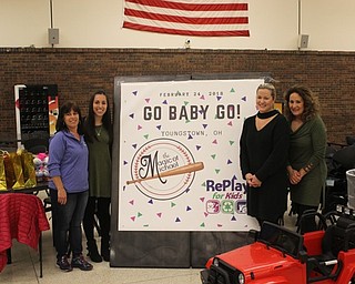 Neighbors | Abby Slanker.The Magic of Michael Foundation participated in the Go Baby Go Build at the Mahoning County Career and Technical Center, with Beverly Lankitus of Mahoning County ESC (left) welcoming Erin Hirschbeck, Kellee Davis and Kim Davis from the foundation to the build on Feb. 24.