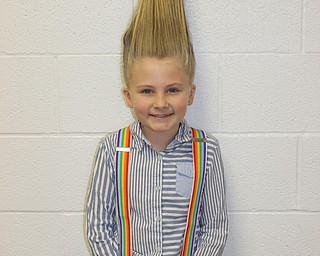 Neighbors | Abby Slanker.A C.H. Campbell Elementary School fourth-grade student took it up a notch with wacky hair to celebrate Wacky Wednesday during the school’s annual Right to Read Week honoring author Dr. Seuss.