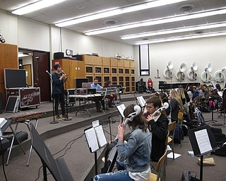 Neighbors | Zack Shively.The Project Mayhem orchestra practices each Wednesday starting in September. In January, they began practicing for two hours. Pictured, the band practiced Justin Beiber's "Love Yourself" on March 7.