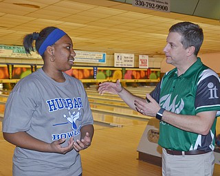 Alexis Cobbin, a Hubbard High School senior, listens to some advice from pro bowler Steve Haas from Enola, PA at Bell Wick Bowling Alley in Hubbard, Ohio on March 16, 2018...Photo by Scott Williams - The Vindicator.
