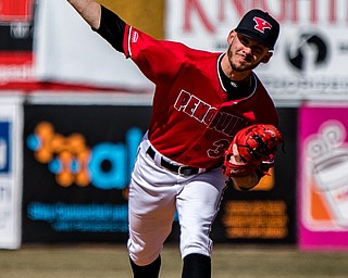 THE VINDICATOR | DIANNA OATRIDGE..Youngstown State's Zack Minney delivers a pitch during the first game of a doubleheader against Milwaukee at Eastwood Field on Saturday.