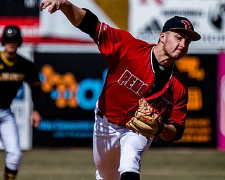 THE VINDICATOR | DIANNA OATRIDGE..Youngstown State starting pitcher Greg Dunham works against the Milwaukee Panthers in the first game of a doubleheader at Eastwood Field on Saturday..