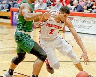 Youngstown State forward Devin Haygood (2) drives past Cleveland State forward Evan Clayborne (22) during their Feb. 24 game at Beeghly Center.