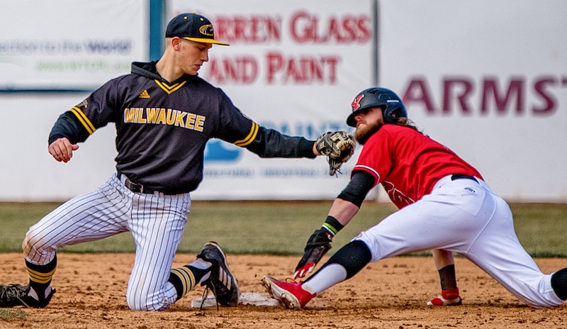 Milwaukee’s Trevor Schwecke tries to tag out Youngstown State’s Jeff Wehler at second base on Saturday during their doubleheader at Eastwood Field. In game two, Wehler was three for four with two doubles and three RBI.