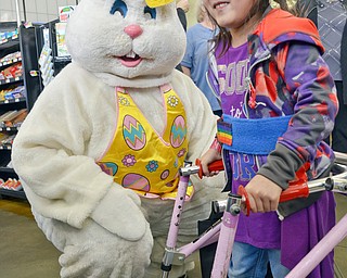 Shi Yu DeBow, age 6, was happy to see the Easter Bunny at Rulli Brothers in Boardman on March 18, 2018.  Shi Yu attended with her father Dan DeBow of Poland.

Photo by Scott Williams - The Vindicator