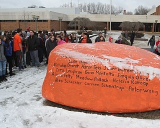 Students at Lordstown High School gather around a rock with names of Florida school shooting victims as part of national walk out day on March 14, 2018.

Photo by William D. Lewis - The Vindicator   