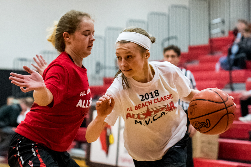 Poland's Bella Gajdos drives the baseline against Lordstown's Jordan Beach during the Al Beach All-Star Classic on Tuesday at Canfield High School