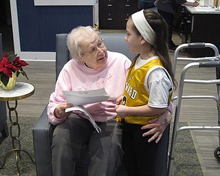 Neighbors | Zack Shively.The Union Elementary students visited The Inn at Poland Way as a part of their Start With Hello Week, a program started by Sandy Hook Promise. The program aims to connect members of the community and schools together. Pictured, Alexis Flood talked with a resident about what they hold most precious.