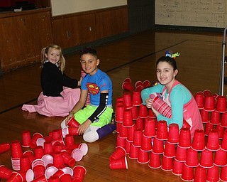 Neighbors | Abby Slanker.A group of C.H. Campbell Elementary School second-grade students worked together to build a structure out of plastic cups at an engineering station during the school’s annual STEM Week on Feb. 28.