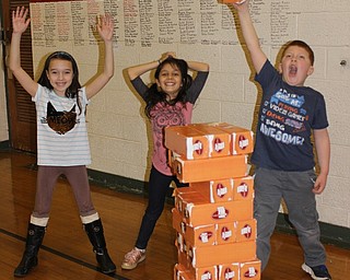 Neighbors | Abby Slanker.A group of C.H. Campbell Elementary School second-grade students celebrated a successful pull while playing a giant Jenga game during the school’s annual STEM Week.