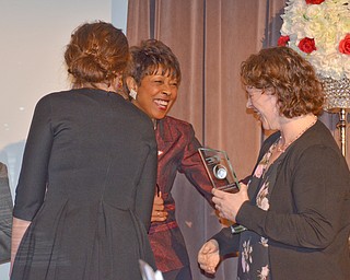 Alison Kaufam, left, and Hillary Fuhrrman, right, share a moment with Dr. Sylvia J. Imler, center, who just surprised them with the Diversity Leadership Achievement Award at the Diversity Leadership Recognition Dinner at Stambaugh Tyler Grand Ballroom on Thursday, March 22, 2018.  Both are from the Office of Assessment.

Photo by Scott Williams - The Vindicator