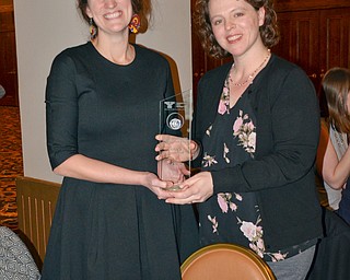 Alison Kaufam, left, and Hillary Fuhrrman, right, display their Diversity Leadership Achievement Award at the Diversity Leadership Recognition Dinner at Stambaugh Tyler Grand Ballroom on Thursday, March 22, 2018.  Both are from the Office of Assessment.

Photo by Scott Williams - The Vindicator