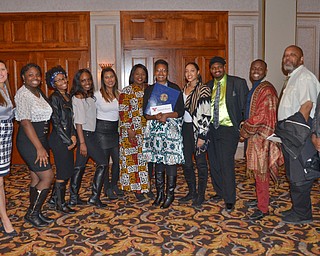 Dr. Sherri Harper Woods, center, stands with new and old staff members from Upward Bound at the Diversity Leadership Recognition Dinner at Stambaugh Tyler Grand Ballroom on Thursday, March 22, 2018.

Photo by Scott Williams - The Vindicator 