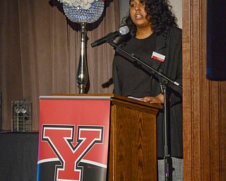 E'Dazjia Solomon-Green, marketing management major and 2nd year Navarro Executive Fellow, reads the poem "I AM Diversity" at the Diversity Leadership Recognition Dinner at Stambaugh Tyler Grand Ballroom on Thursday, March 22, 2018.

Photo by Scott Williams - The Vindicator