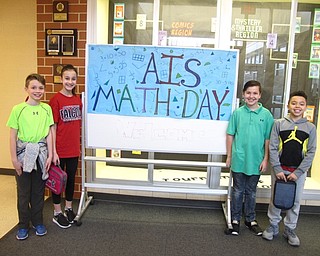 Neighbors | Zack Shively.Austintown Intermediate School celebrated Math Day on March 14. They had a number of math-related activities in each grade level for the day. Pictured are, from left, Luke Hammond, Ava Denari, Hunter Smart and Ross Harris.