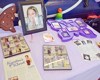 A display of photos and memories of Kyrsten at the Kyrsten's Kloset event at Roosevelt Elementary School in Hubbard, Ohio on March 24, 2018.

Photo by Scott Williams - The Vindicator