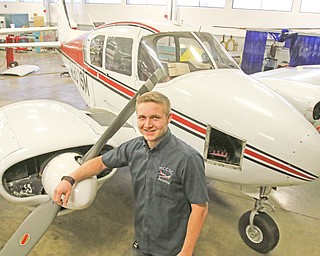 Joseph Virostek, a senior in the Mahoning County Career and Technical Center's aviation maintenance program, has been accepted into an aerospace engineering program in Hawaii and earned his pilot's license on his own time.

Photo by Robert K. Yosay - The Vindicator