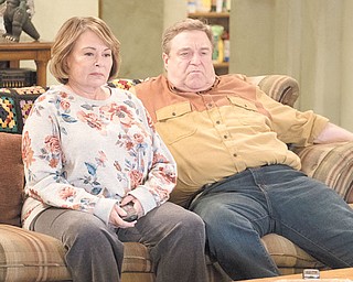 Roseanne Barr looks more glamorous, John Goodman slimmer. But the mass-market plaid couch is a giveaway that ABC’s “Roseanne” revival hasn’t ditched its roots.