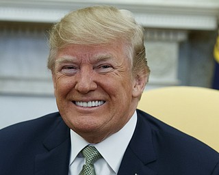 President Donald Trump smiles during a meeting with Irish Prime Minister Leo Varadkar in the Oval Office of the White House, Thursday, March 15, 2018, in Washington. 

(AP Photo/Evan Vucci)